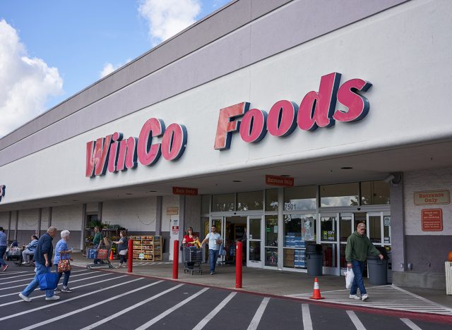 Tigard, Oregon, USA - Sep 24, 2019: The entrance to a WinCo Foods supermarket in Tigard, a suburb within the Portland metro area.