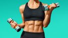 woman with six-pack abs holding dumbbells, concept of standing ab workout