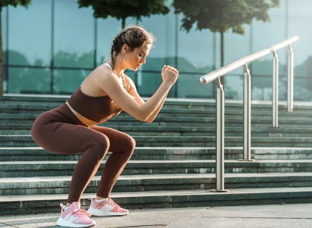 woman doing bodyweight squats