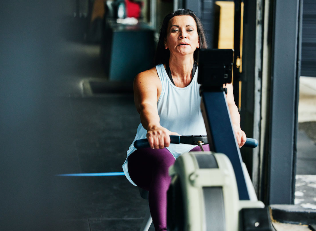 woman doing seated rows exercise, concept of workout to maintain a lean body after 50