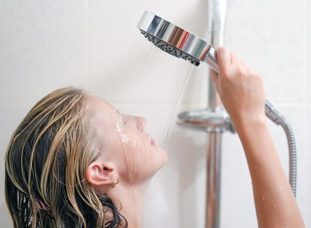 woman taking cold shower