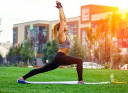 woman doing yoga lunge, concept of the best exercises for a strong pelvic floor