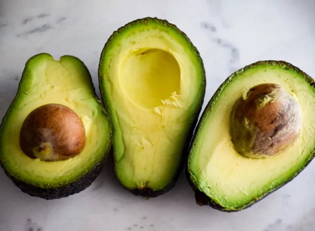 halved avocados with pit