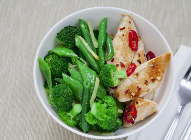 healthy chicken with green veggies bowl