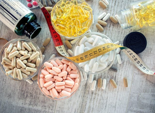 variety of dietary supplements, concept of supplements trainers take regularly