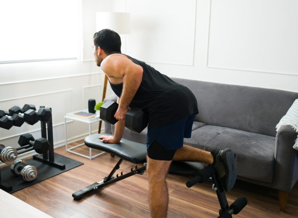 Man performing a dumbbell row