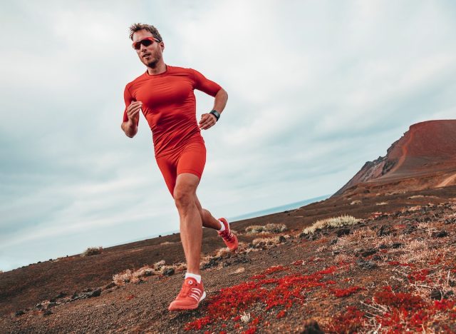 fit man sprinting in desert, concept of best workout to test your fitness