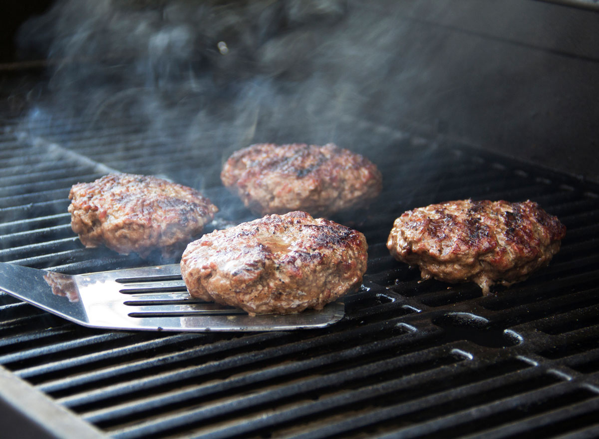 cooking hamburger patties on the grill