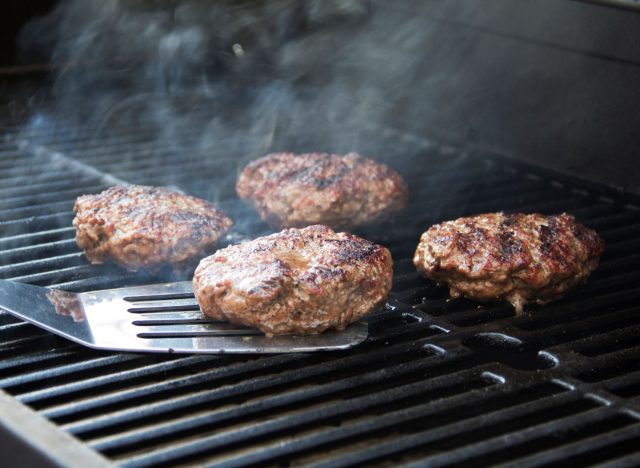 cooking hamburger patties on the grill