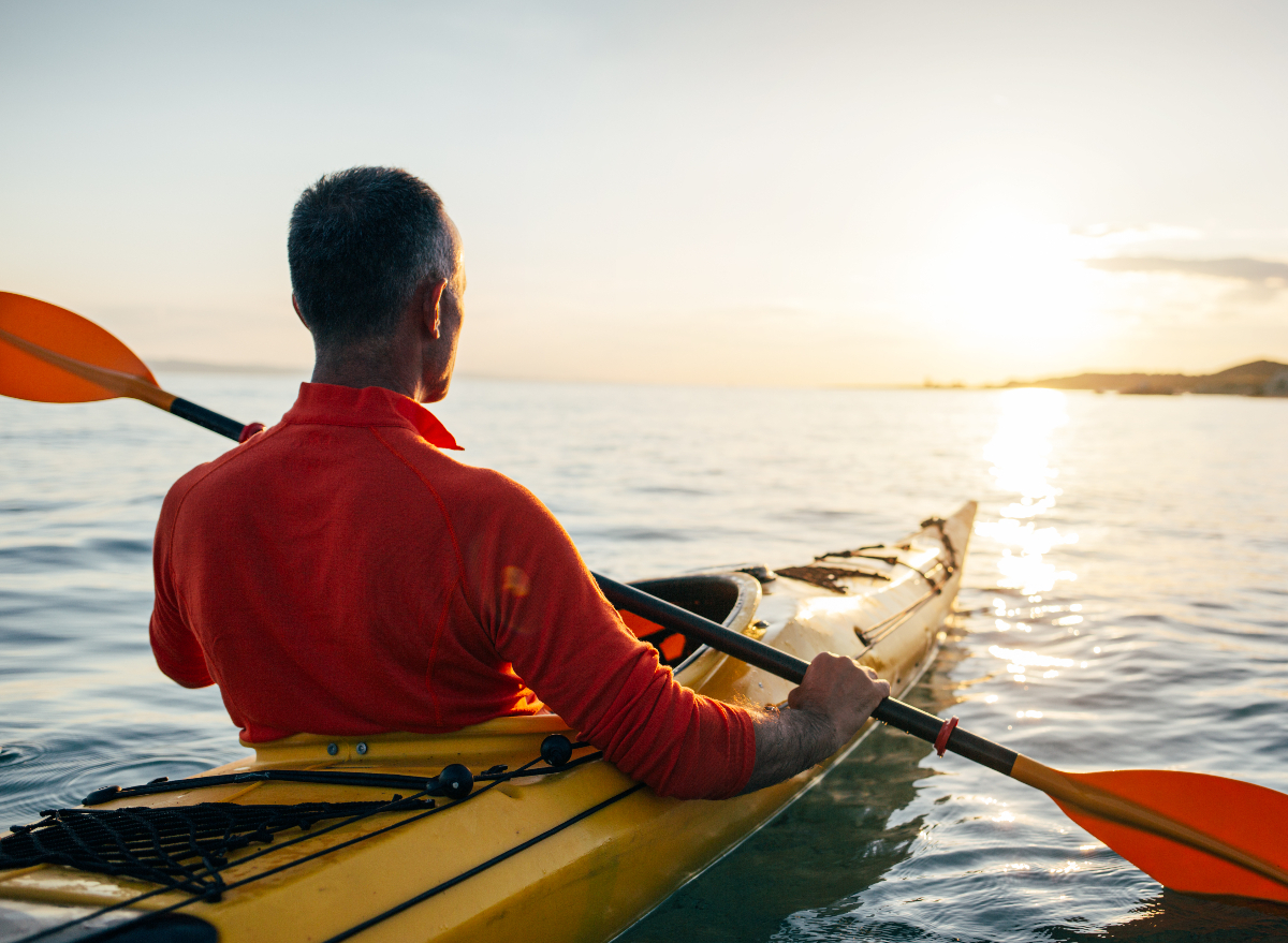 man kayaking, concept of fitness habits for men in their 40s