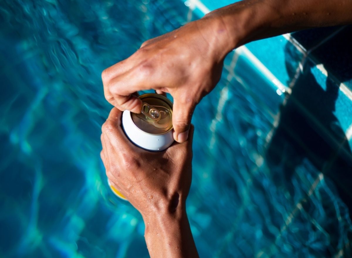 opening can by the pool