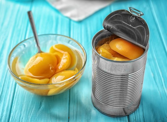 canned fruit in can and bowl