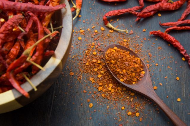 Cayenne pepper on a wooden floor