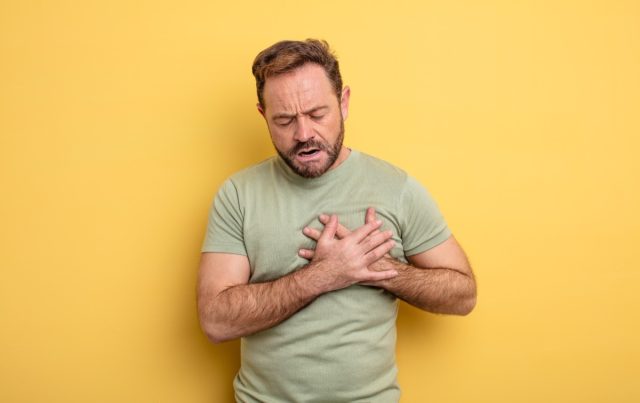 Man holding heart