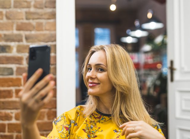 woman taking selfie