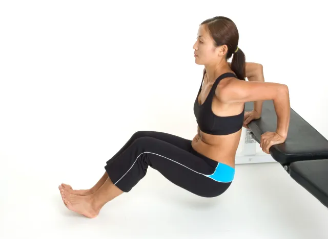 woman doing tricep dips
