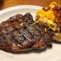 Bone-in ribeye at Texas Steakhouse