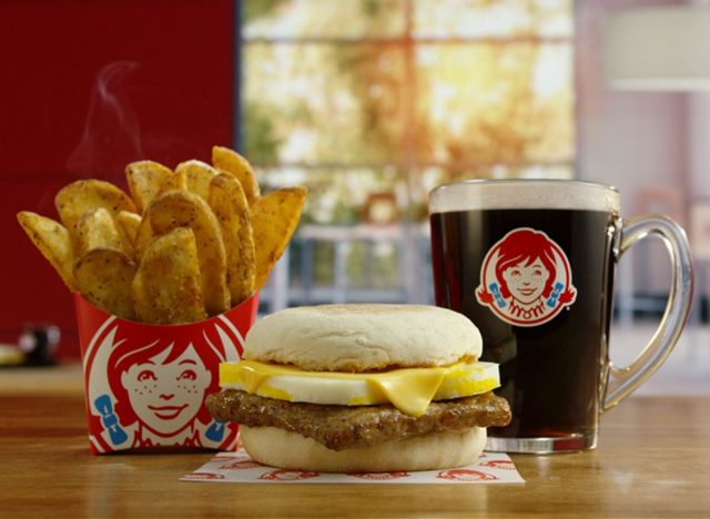 Wendy's English Muffin Sandwich, coffee, and potato wedges