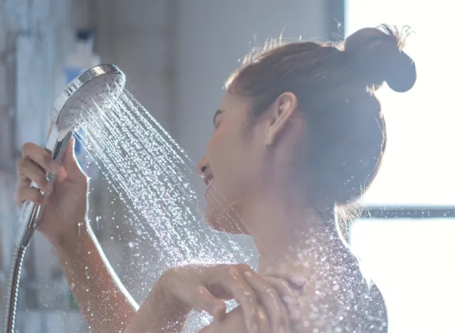 happy woman in shower