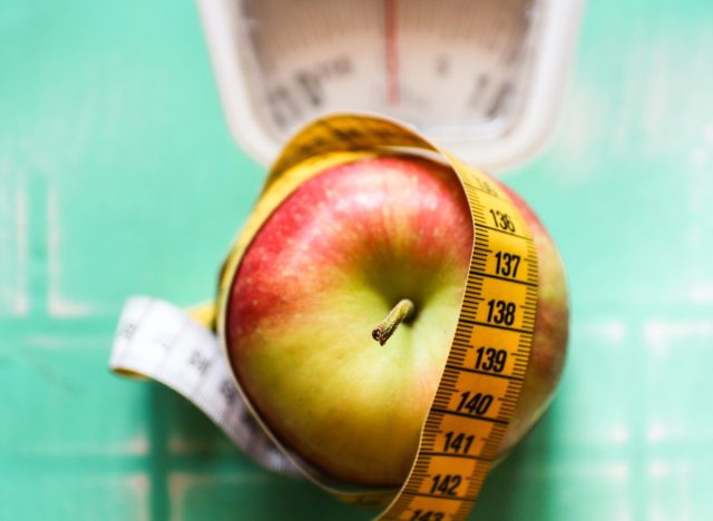 measuring apple diet concept