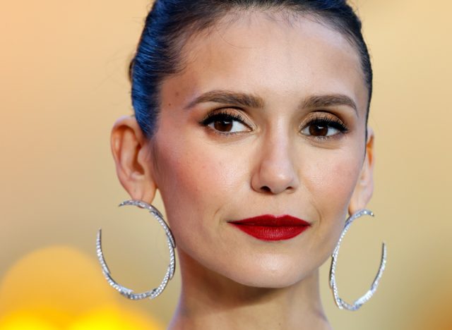 LONDON, UNITED KINGDOM - MAY 19: (EMBARGOED FOR PUBLICATION IN UK NEWSPAPERS UNTIL 24 HOURS AFTER CREATE DATE AND TIME) Nina Dobrev attends the UK premiere and Royal Film Performance of 'Top Gun: Maverick' in Leicester Square on May 19, 2022 in London, England. (Photo by Max Mumby/Indigo/Getty Images)