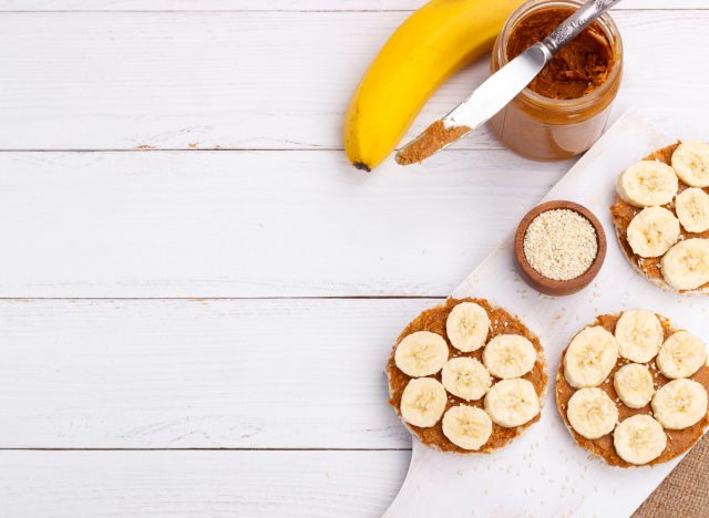 nut butter banana rice cakes, concept of superfood snacks to melt belly fat