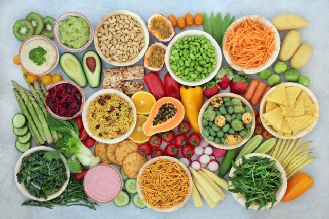 Plant based vegan food for a healthy diet with vegetables, fruit, grains, snacks and dips. High in protein, antioxidants,omega 3, minerals, fibre and anthocyanins. Ethical eating to lower cholesterol.