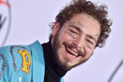 LOS ANGELES, CA - OCTOBER 09: Post Malone attends the 2018 American Music Awards at Microsoft Theater on October 9, 2018 in Los Angeles, California. (Photo by Axelle/Bauer-Griffin/FilmMagic)