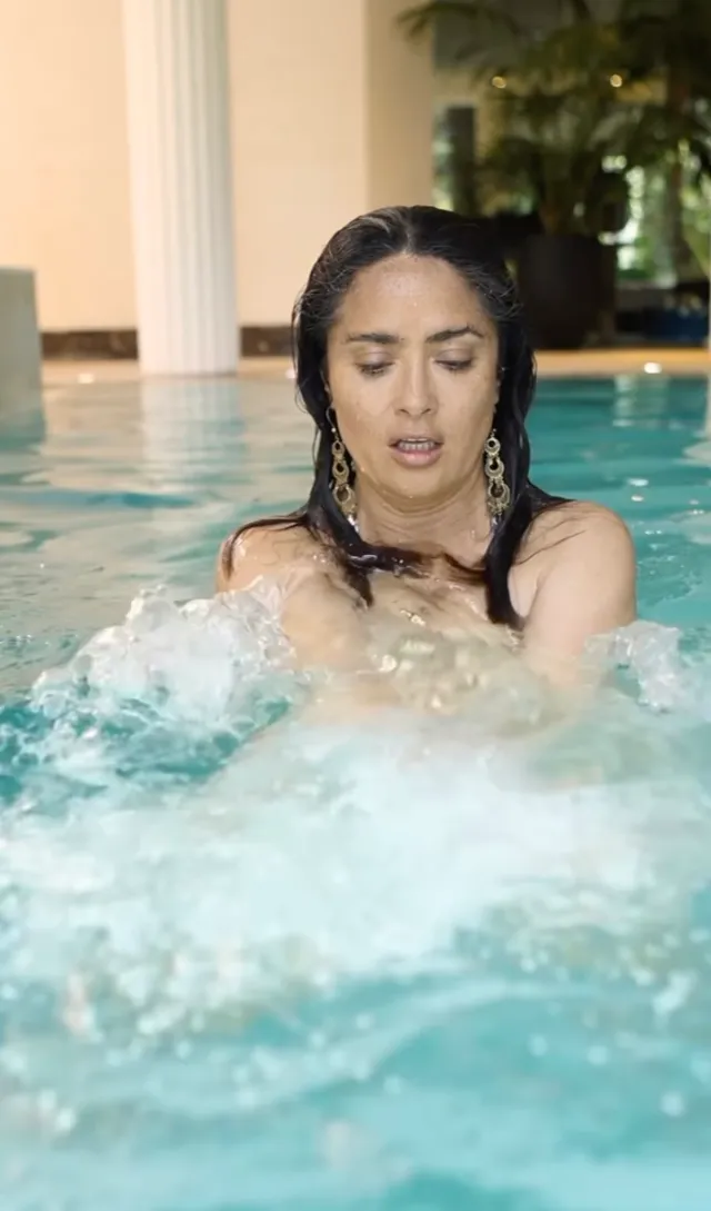 Salma Hayek exercising in a pool