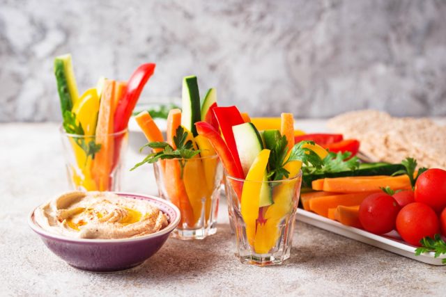 Snacks bar. Healthy vegetables sticks and hummus