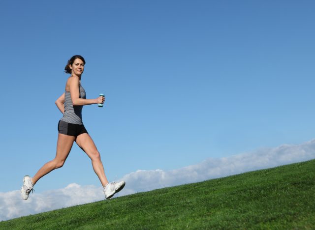 woman running uphill