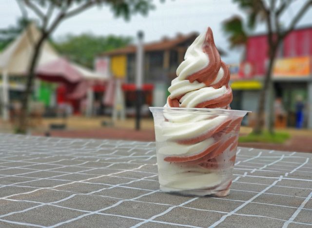 chocolate and vanilla soft serve in a cup