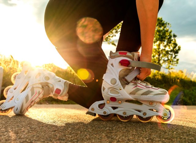 close-up putting on rollerblades