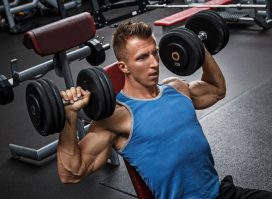 man dumbbell shoulder press, concept of daily workout to prevent muscle loss