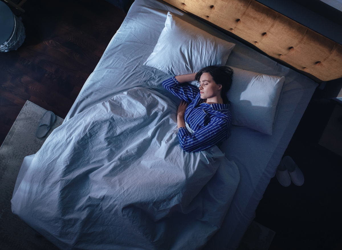 woman sleeping in bed, concept of cricketing