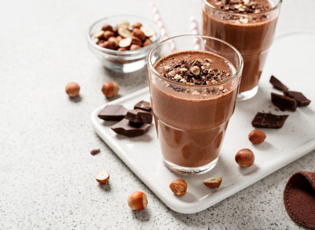 glass of chocolate hazelnut smoothie on a countertop