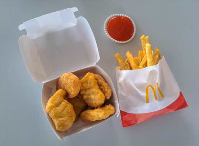 McDonald's Regular French Fries And Chicken McNuggets With Sauce.