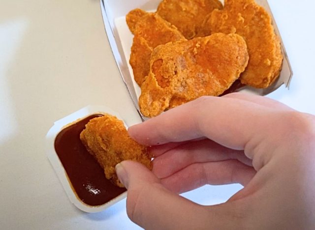 dipping McDonald's Spicy Chicken McNuggets