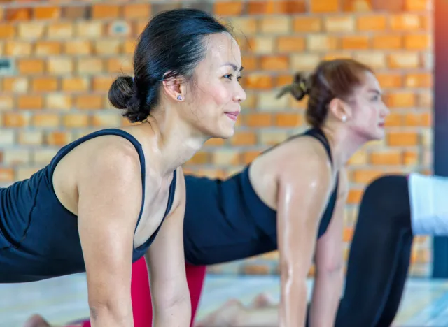 woman close-up in hot yoga class
