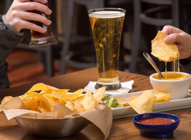 on the border chips, salsa, beer, queso