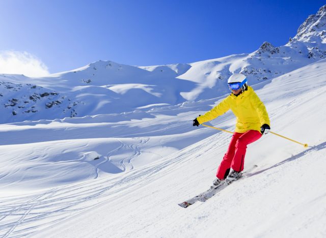 woman skiing downhill