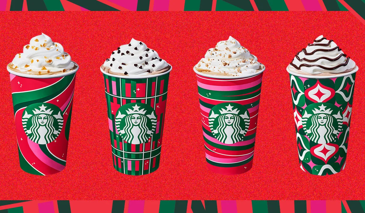 festive starbucks holiday drinks on a red background