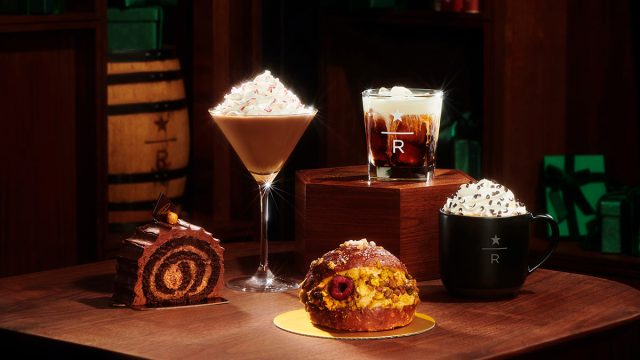 a display of starbucks reserve holiday drinks and baked goods