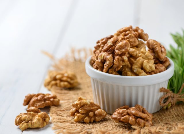 walnuts in bowl, concept of diet habits to live longer