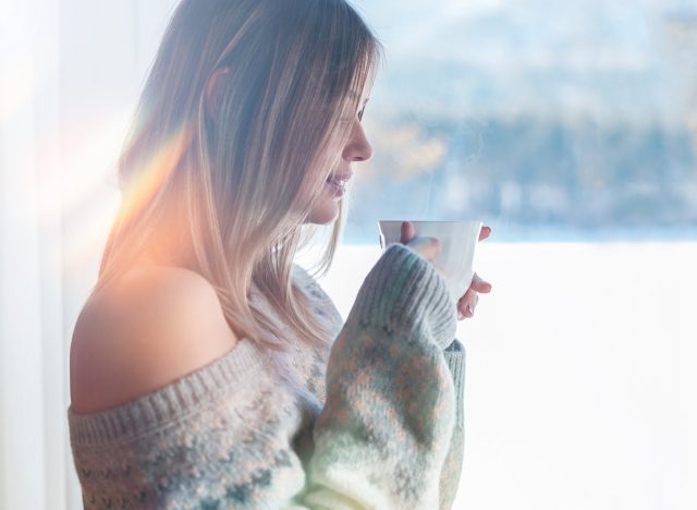 woman holding coffee