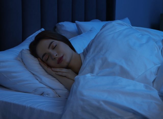 woman sleeping peacefully in bed