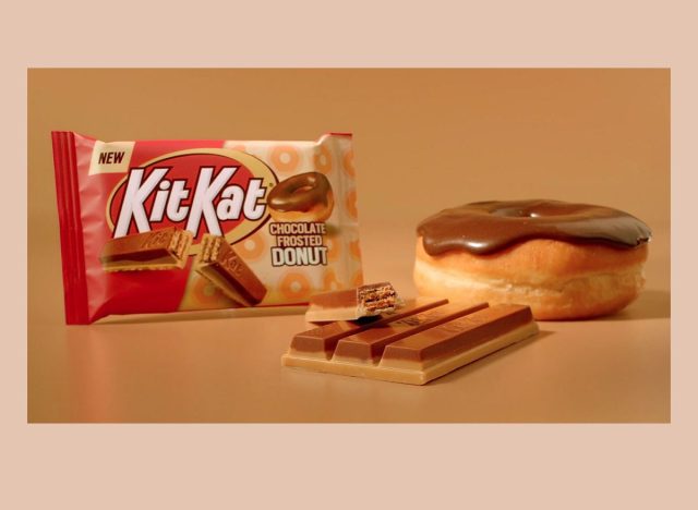 kit kat chocolate frosted donut package displayed beside a real donut and the candy
