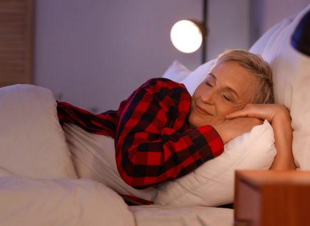mature woman sleeping in bed, concept of cognitive shuffling to fall asleep faster