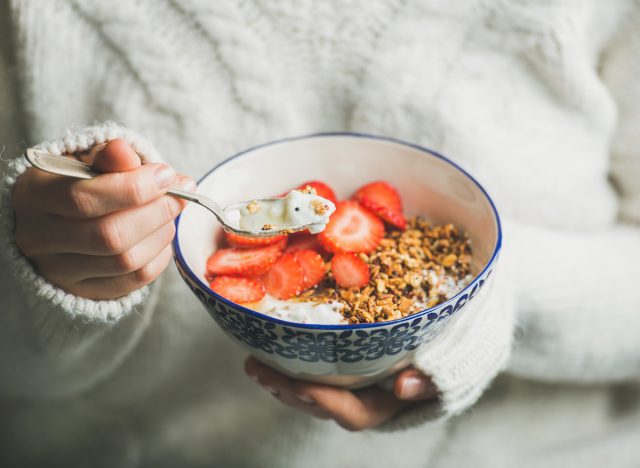 fresh fruit and berries with yogurt and granola