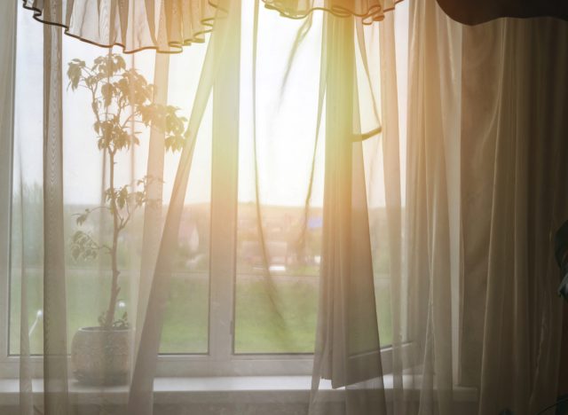 morning sunlight streaming through curtains